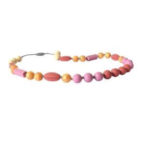 Itzy Ritzy | Teething Happens Chewable Mom Necklace | Pink & Gold